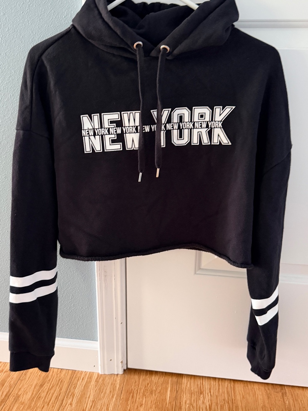 H&M Black Cropped Hoodie with White Stripes and 'New York' Text
